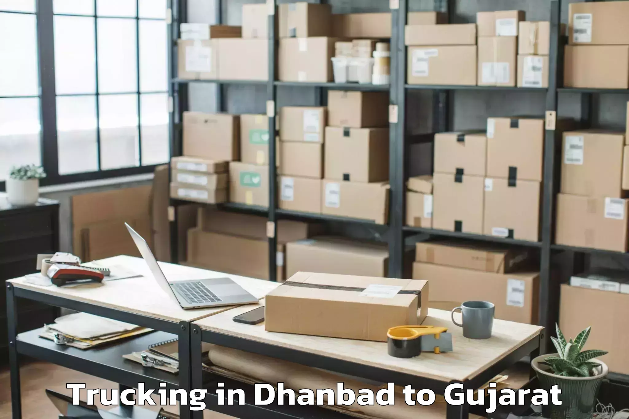 Book Dhanbad to Mehmedabad Trucking Online